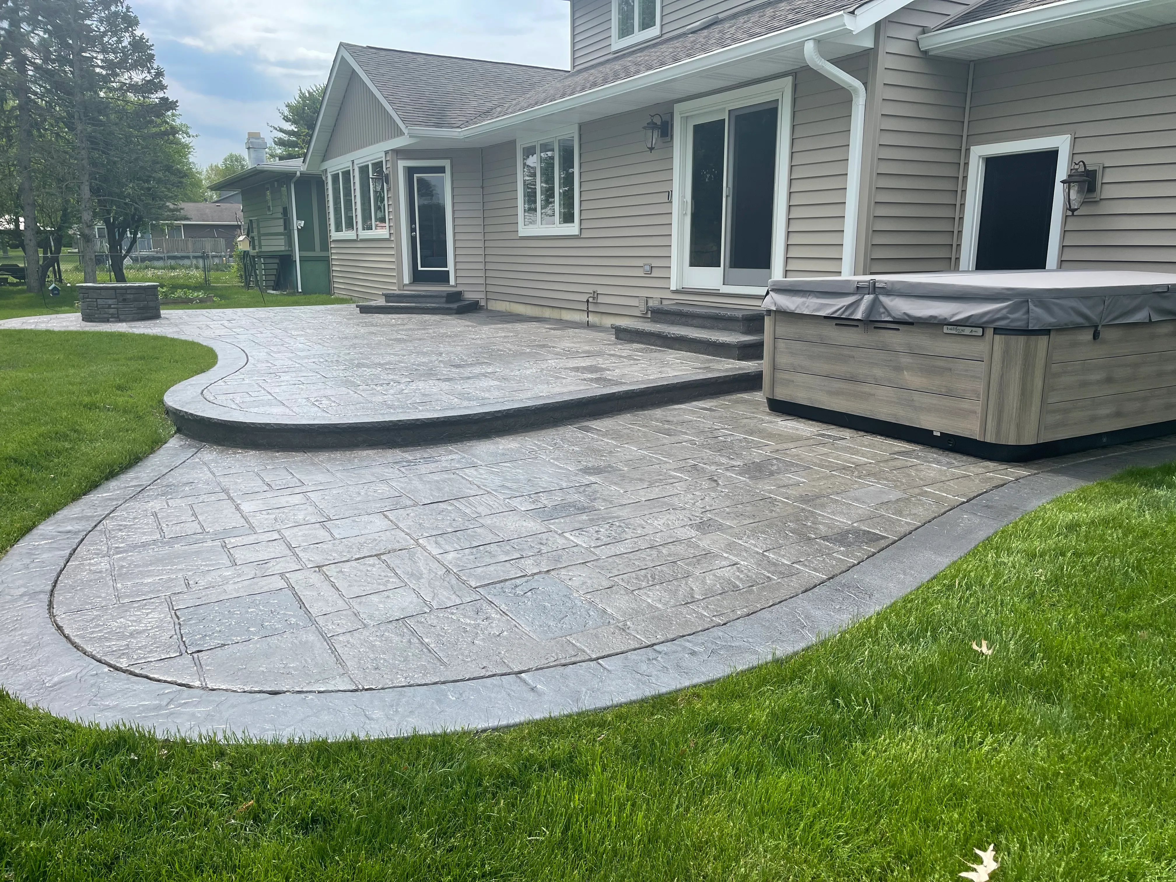 rectangular fire feature stamped concrete patio crown point indiana