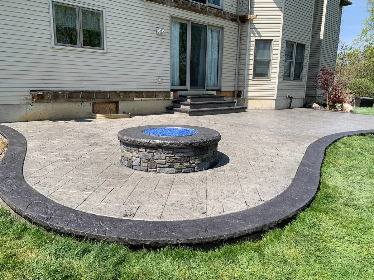 Hoosier Concrete crew working on a stamped patio near Schererville, Indiana Hoosier Concrete crew working on a stamped patio near Schererville, Indiana